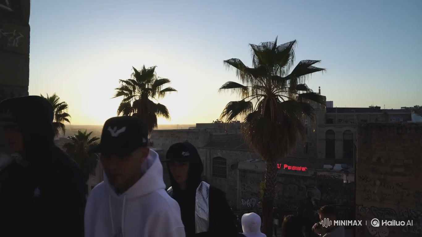 Load video: luxury streetwear brand video for FACES IN BARCELONA CITY, blending urban Barcelona energy with high-end fashion aesthetics